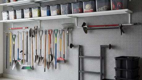A tidy home garage wall with storage hooks and a bike stand