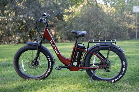Snapcycle step-thru e-bike on grass in an autumn setting
