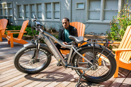Snapcycle e-bikes on a wooden deck in a relaxed home setting